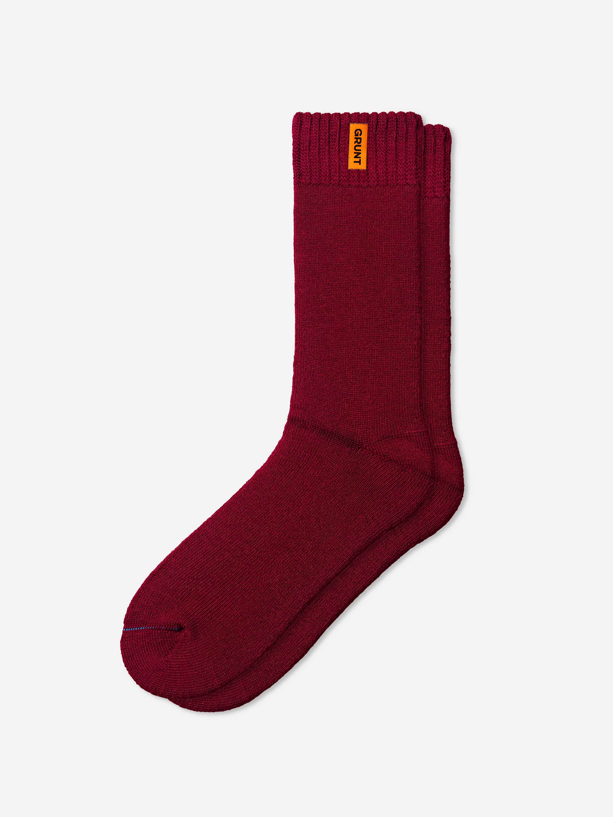 Maroon bamboo work sock with a brand label on a white background